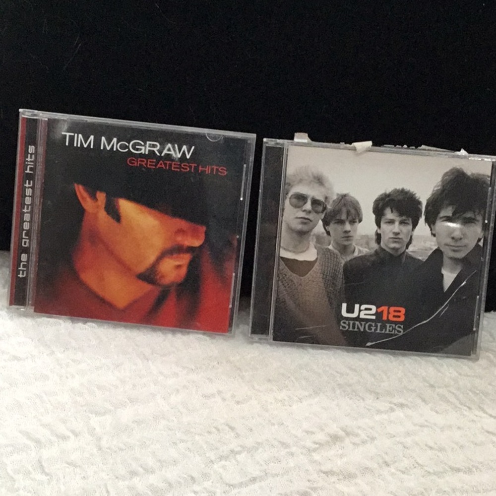 Tim McGraw Greatest Hits and U218 Singles CD’s